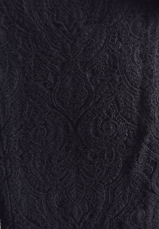 Pantalón básico brocado de Mango 