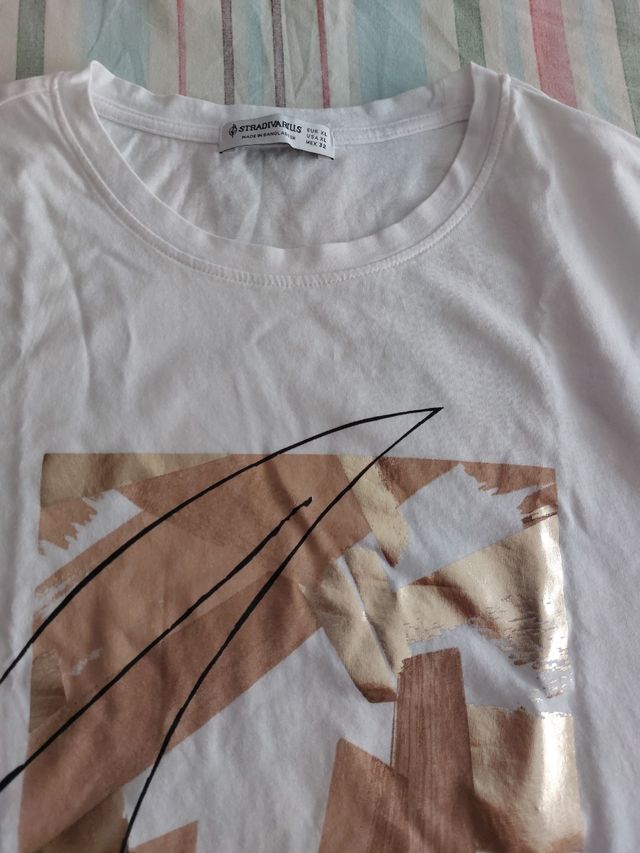 camiseta blanca como nueva