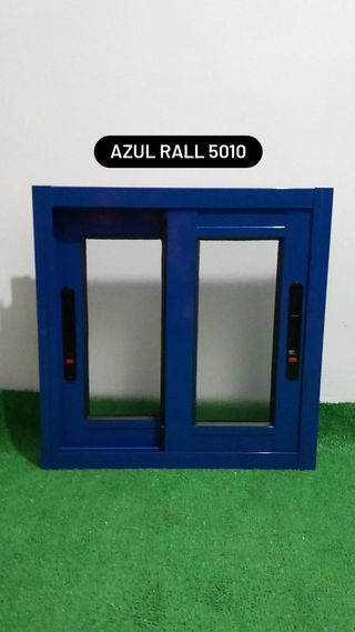 Ventana de aluminio plata y bronce