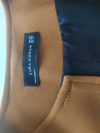 Abrigo cremallera color caldera