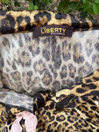 Blusa terciopelo elastico leopardo lazo rosa