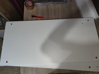 Mesa de centro con tablero elevable