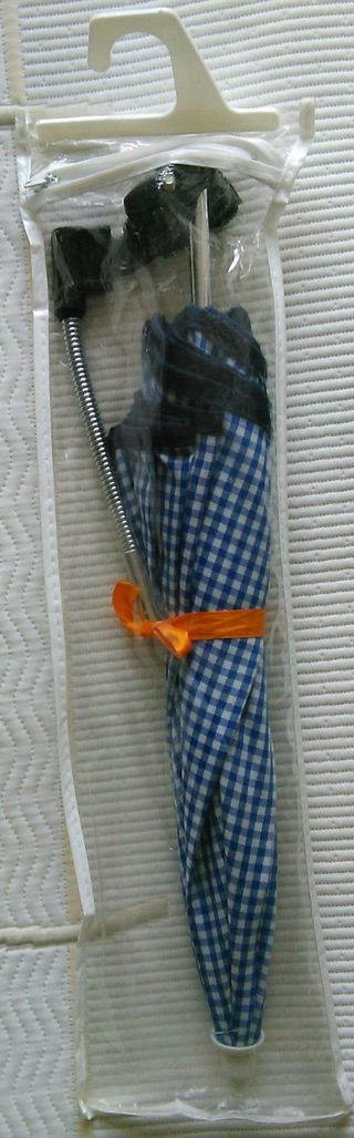 Silla, colchoneta y sombrilla