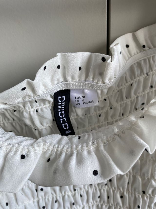 top abullonado HyM 34