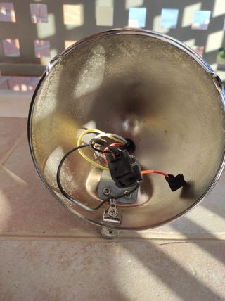 Carcasa original faro Harley Davidson .