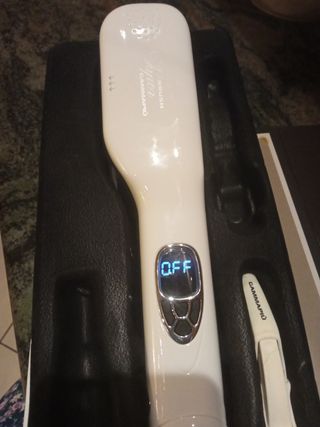 Spazzola lisciante a vapore.