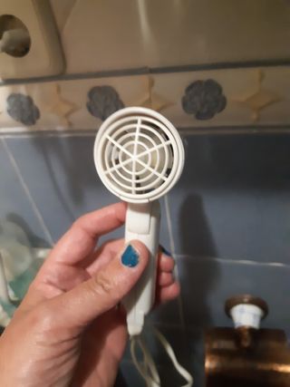 Secador de viaje en perfecto funcionamiento