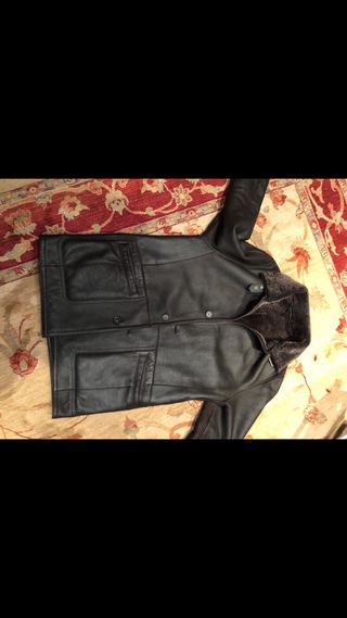 Chaqueta de cuero y piel al interior talla xl