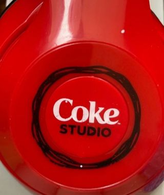 Auriculares coca cola