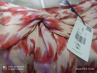 blusa y falda de scalpers con etiqueta en oferta