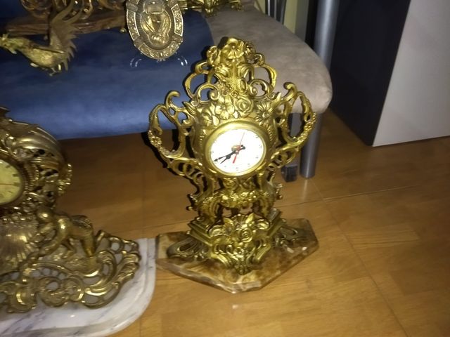 orologi antichi in bronzo grandi e pesanti