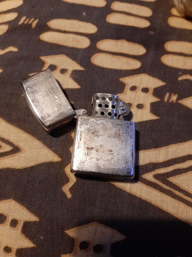 Antiguo mechero penguin