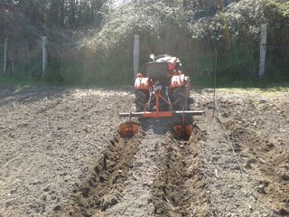 abre riego mini tractor