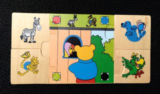 Caja con 6 puzzles de madera
