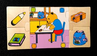 Caja con 6 puzzles de madera