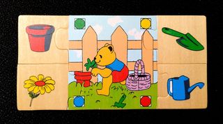 Caja con 6 puzzles de madera