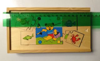 Caja con 6 puzzles de madera