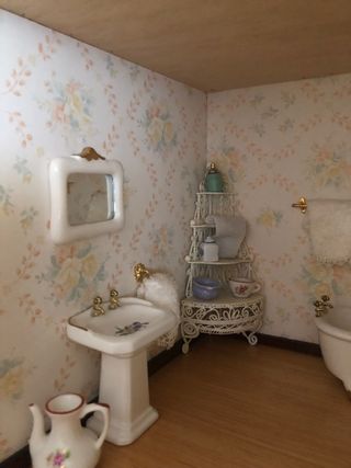 Casa de muñecas y accesorios