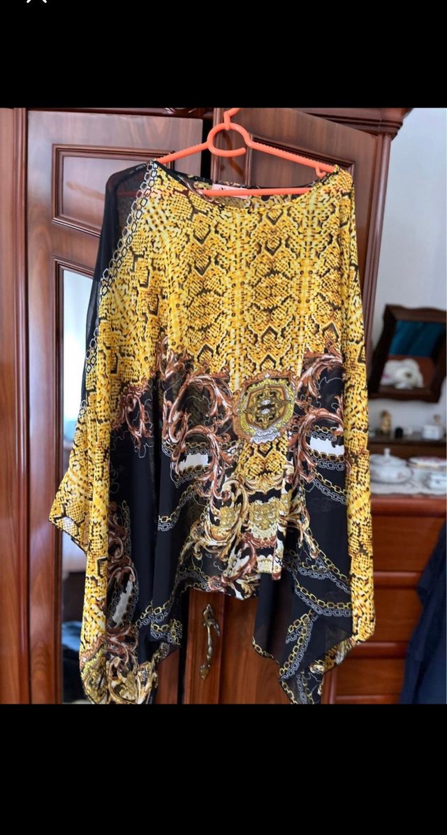 tunica mangas murcielago