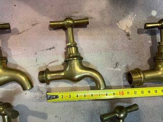 Grifos de latón. Antiguos