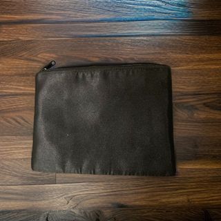 Bolso clutch negro metalizado adornos de flores