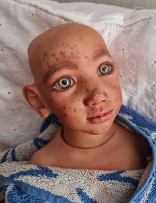 Restauro e bambole personalizzate