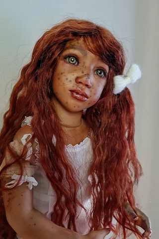 Restauro e bambole personalizzate