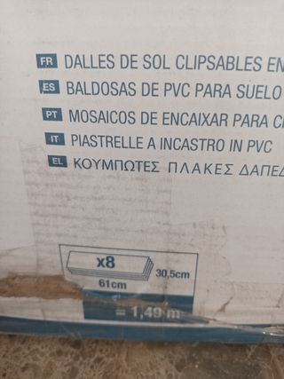 Caja nueva baldosas PVC +otras usadas y quitadas.