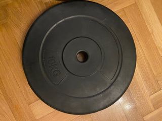 maquina gimnasio + discos + barra