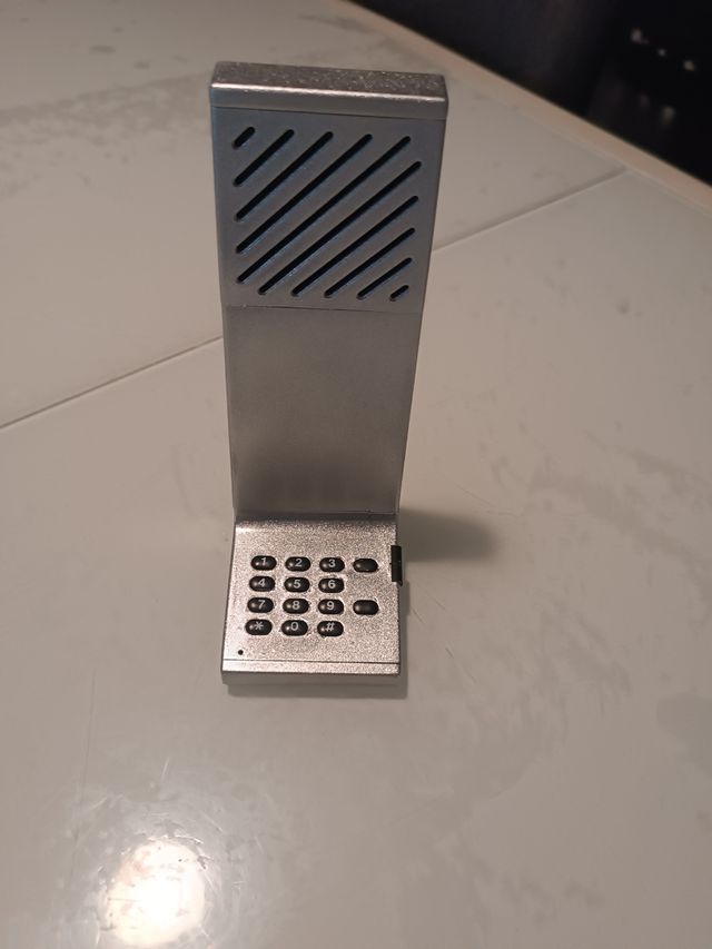 Teléfono Erikofono gris