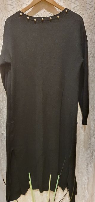 Chaqueta de punto larga nueva .