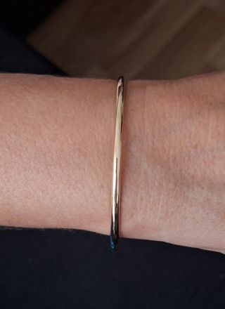 Pulsera media caña oro 18k