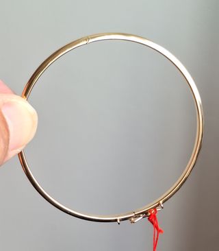 Pulsera media caña oro 18k