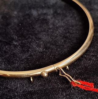 Pulsera media caña oro 18k