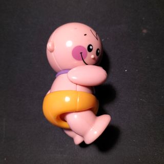 Muñeco  Tolo para niños pequeños pañal amarillo.