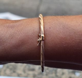 Pulsera media caña obalada oro 18k