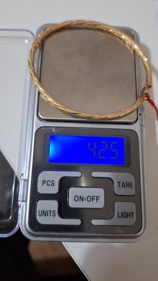 Pulsera media caña obalada oro 18k