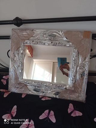 Specchio barocco intagliato in foglia argento