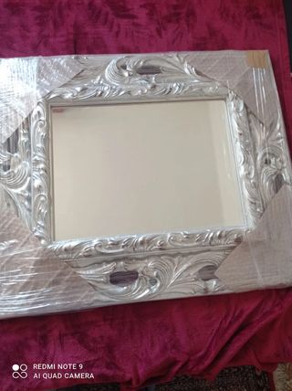 Specchio barocco intagliato in foglia argento