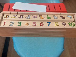 Juego montessori caja tri