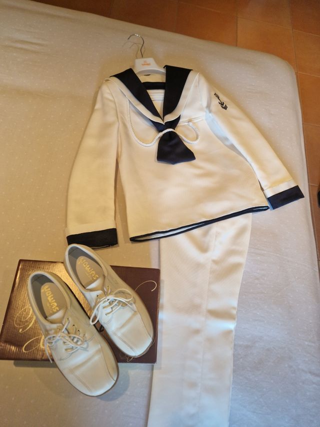 traje comunión niño talla 8 años está nuevo..