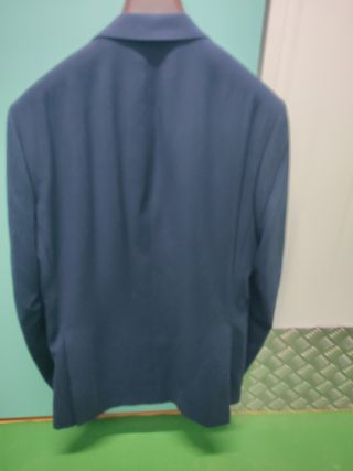 Traje de caballero en perfecto estado