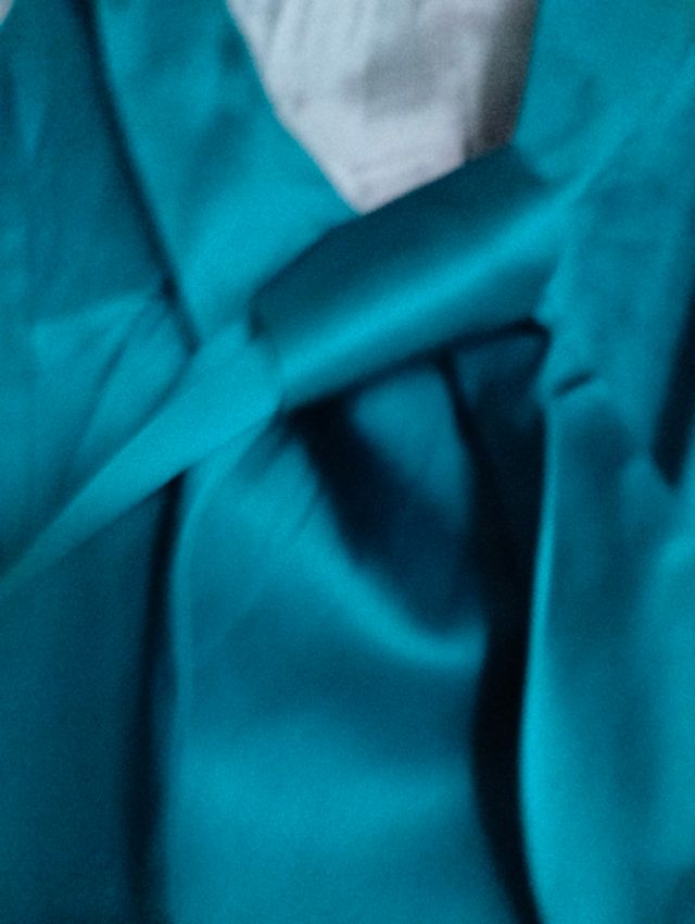 Top azul verdoso metalizado Trucco.