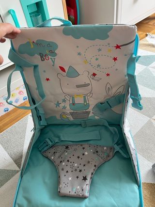 Trona de viaje y cambiador