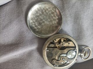 reloj regulador de plata