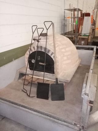 Horno de barro calentado a leña
