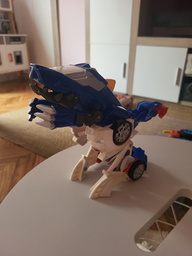 Coche Dinosaurio.Luces y sonido VTECH