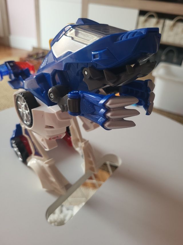 Coche Dinosaurio.Luces y sonido VTECH