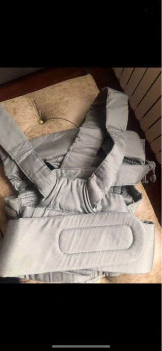 mochila portabebe Tomy