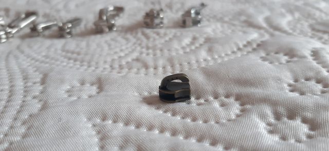 Cursores y tiradores para cremalleras